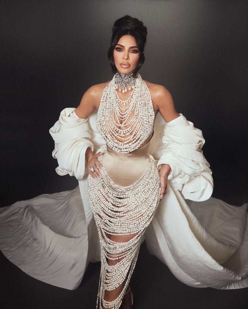 Kim Kardashian “Dripped In Pearls” In Nude Dress At Met Gala